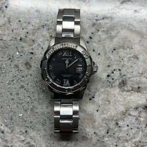 Ladies Invicta black face silver watch